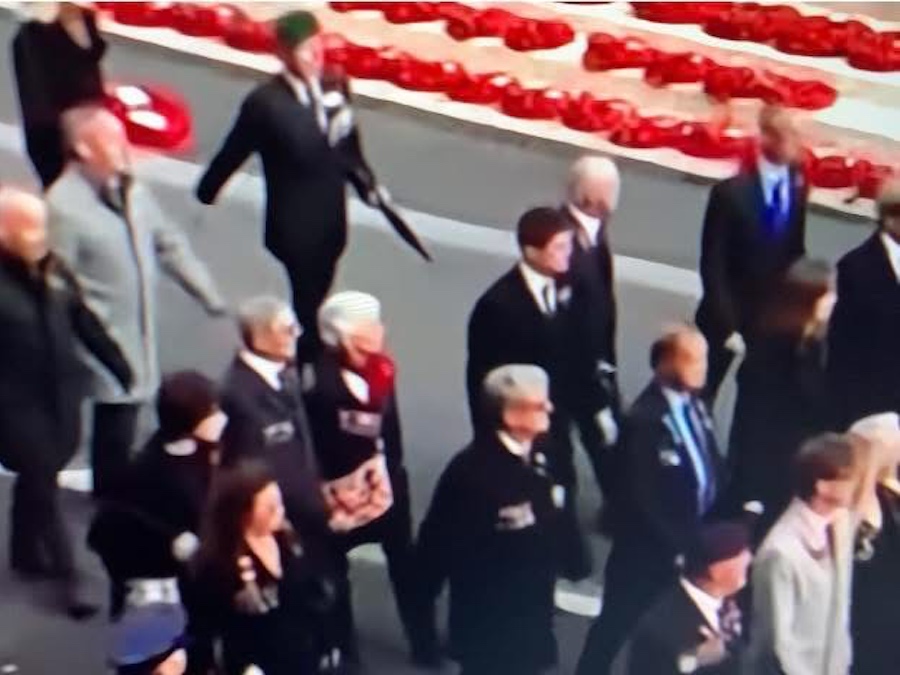 Members of the Lisbon Maru Memorial Association march by the Cenotaph on Remembrance Sunday 9th November 2025