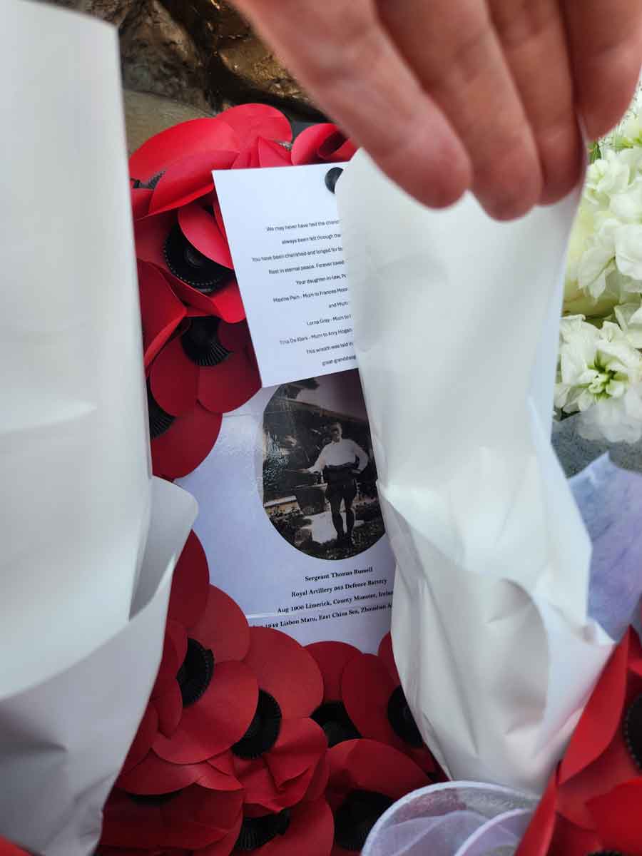 A wreath commemorating Thomas Russell laid by his great granddaughter Frances Moore  at the Chinese Memorial Qingbang Island, Dongji Town, Zhoushan, East China in May 2026. Thomas Russell was lost in the sinking of the Lisbon Maru.